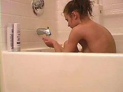 Ponytailed teen seductress Addison showing her assets in bath tub