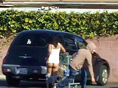 Pervert Guy runs up and pulls some radom ladys shorts down in the supermarket parking lot...