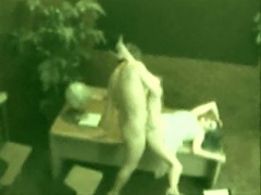 Secretary working late and the janitor comes by and fucks her & is busted on security cam.