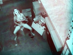 Chick working at porn shop jills off on security cam to the porn while stocking it