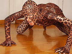 Magdi taking her clothes off and revealing her sexy woman-leopard latex suit!