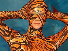 This provocative babe is very dangerous with or without her spandex tiger-woman suit!