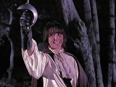 Nina Hartley is one fiery brunette bitch and would tackle any man. Watch her in a sword fight with this older dude and seemingly wo