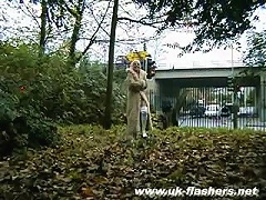 Hot MILF gets naked beside a road