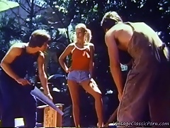 Two guys are working in the garden when a blond girl comes up to them, asking if they can do